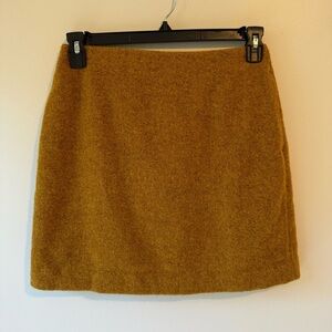 mustard wool blend Uniqlo mini skirt pockets back zip a-line lined size 4